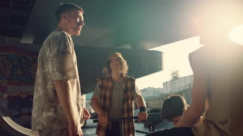 Youngster Friends Socializing Together at Skate Park