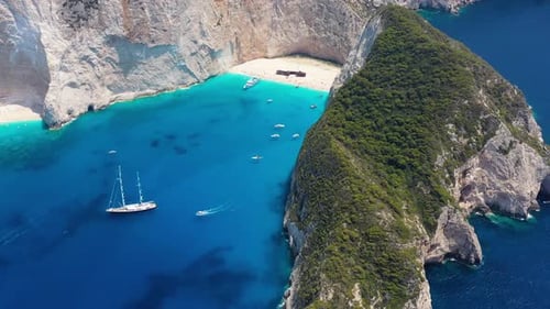 View of Navagio beach, Zakynthos Island, Greece. Blue sea water. Rocks and sea.