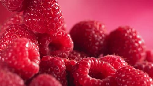 Falling Fresh Raspberries in Slow Motion