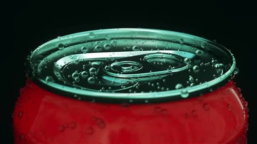 Rotating Red Beverage Can with Condensation and Water Droplets