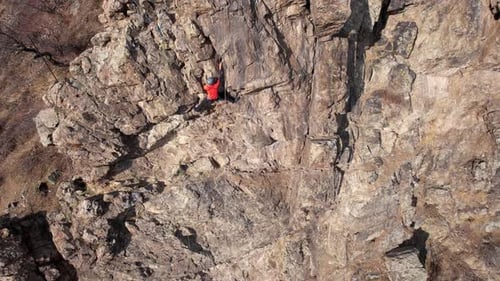 Rock Climbing Training on Steep Slope in Mountains