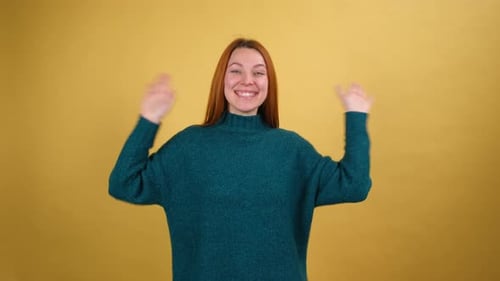 Young Red Hair Woman Posing Isolated on Yellow Color Background Studio