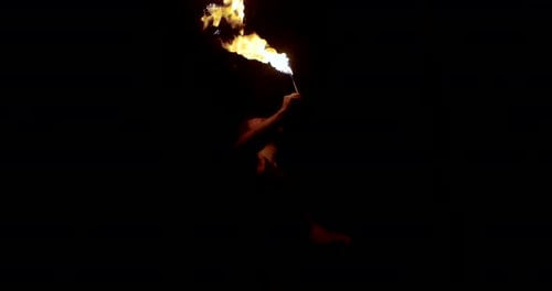 Fire Breather Performs at Night