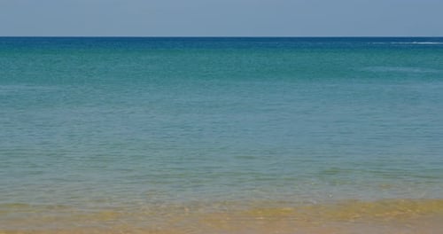 Beautiful Sandy Beach with Clear Blue Water
