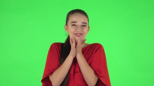 Portrait of Pretty Young Woman with Surprised and Shocked Wow Face Expression. Green Screen