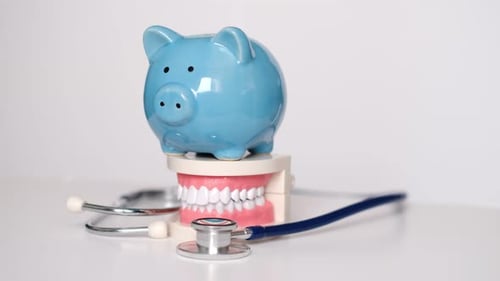Piggy Bank with White Teeth Model on White Background