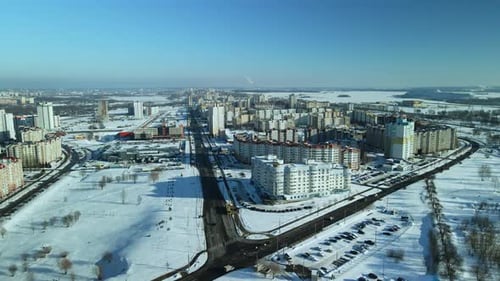 City quarters. Multi-story houses. Winter cityscape.
