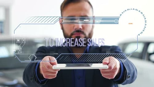 Man Holds Tablet with Futuristic Sales Animation