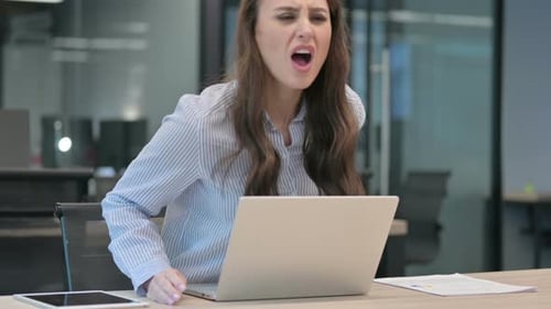 Woman Working in Office Expressing Frustration then Composing Self