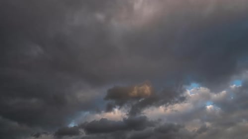 Dramatic Time-Lapse of Ominous Cloudy Sky at Sunset