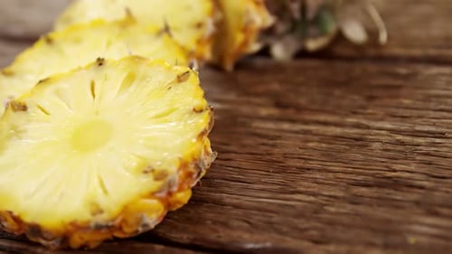 Pineapple Slices on Rustic Wooden Table