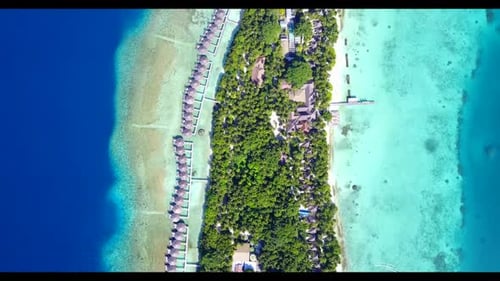 Aerial flying over abstract of exotic seashore beach holiday by blue green ocean with bright sand ba
