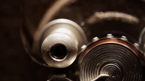 Antique Film Projector Gears Rotating Close Up