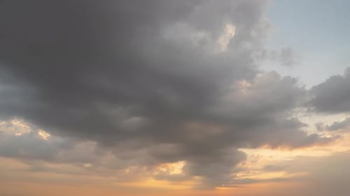 Time lapse of sunset sky. Abstract nature background. Dramatic blue with orange