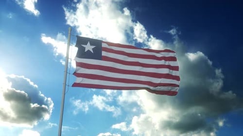Realistic Waving Liberia Flag Animation in Blue Sky with Clouds