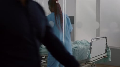 Young Girl Eating in Hospital Bed