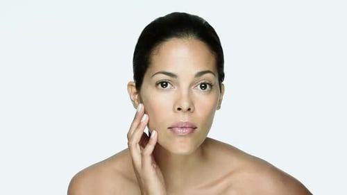 Woman Massages Her Face for Beauty Routine