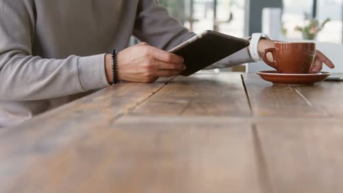 Man using digital tablet and mobile phone