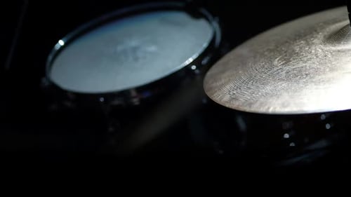 The Drummer Plays on Ride Cymbal