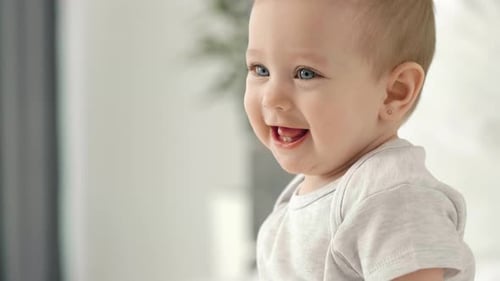 Baby with a big smile on the face