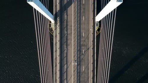 Vehicles Crossing a Suspension Cable Stayed Bridge in Slow Motion