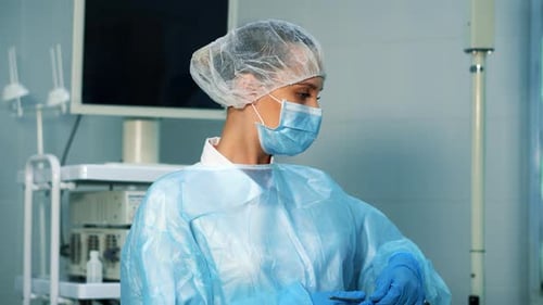 Surgeon Prepares for Surgery in Operating Room