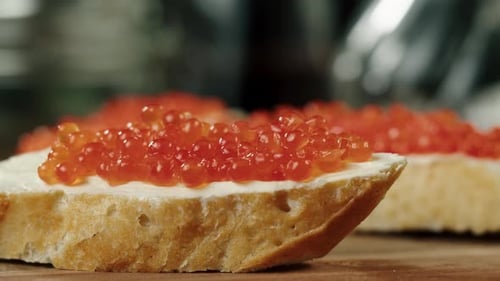 Caviar Being Placed on Bread Appetizer, Close-Up