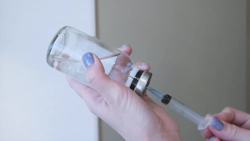 Drawing Liquid from Medical Vial Using Syringe