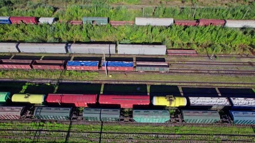 Colorful Freight Trains on the Railway Station
