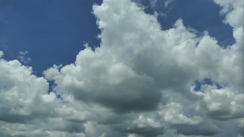 Time lapse of white cloud moving pass around sky background