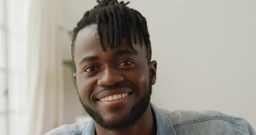 Portrait of a man at home smiling