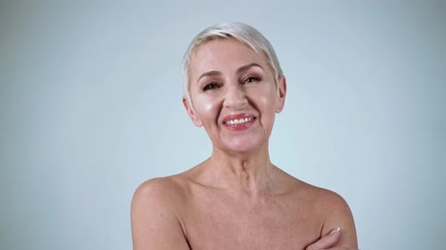 Elegant Mature Woman Laughing with Delight