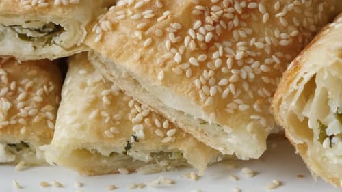 Close Up of Golden Sesame Pastries Stacked