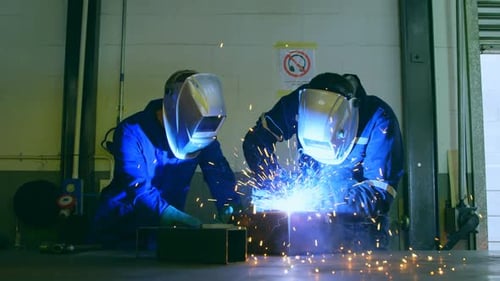 Robotic engineers working in robotic warehouse 4k