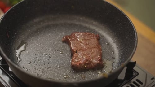 Liver Cooking in Frying Pan on Stove