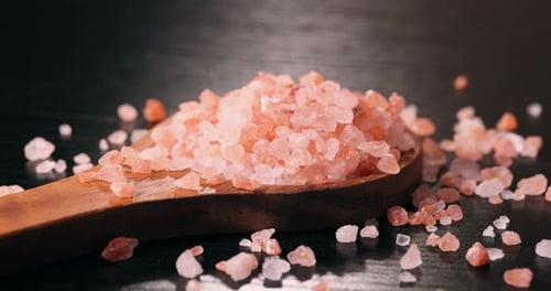 Wooden Spoon Filled with Himalayan Pink Salt