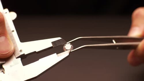 Diamond Measured Precisely with Caliper and Tweezers