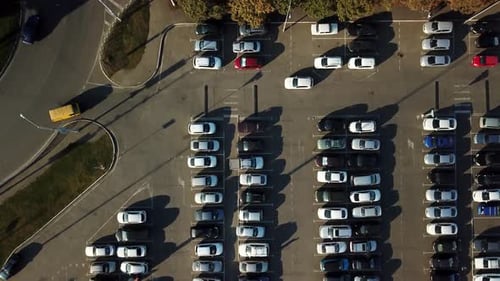 Aerial View of Parking with Parked Cars
