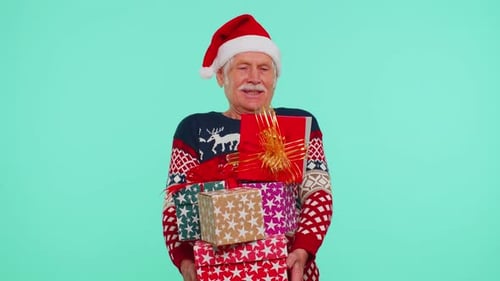 Happy Senior Man with Christmas Presents