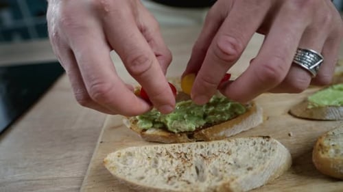 Making Avocado Toast with Sliced Tomato