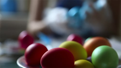 Colorful Easter Eggs on Plate Ready for Celebration