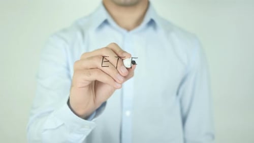 Man Writes ETF on Transparent Surface