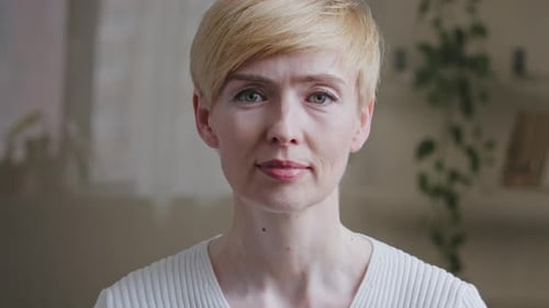 Smiling Woman Portrait with Short Blonde Hair