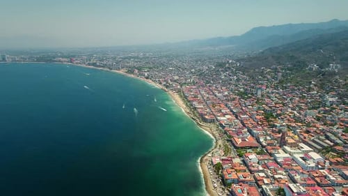 Aerial View of Coastal City with Ocean and Beach