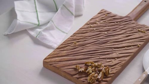 Preparing Avocado Toast Snack on Wooden Cutting Board