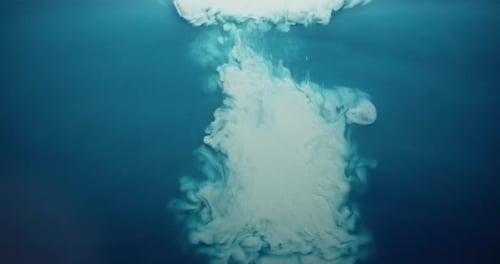 Abstract White Substance Expanding in Blue Environment