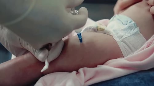 Close Up Shot Doctor Makes Injection to Baby