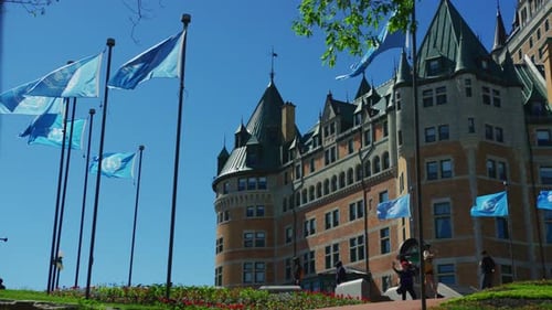 Beautiful Building in Quebec with Flags Waving