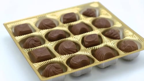 Assorted Milk Chocolates in Gold Foil Container