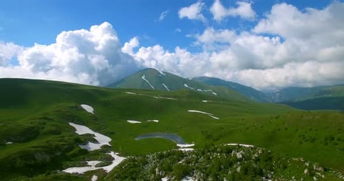 Mountain Pass With Glaciers And Green Grass In Mountains Of Caucasus